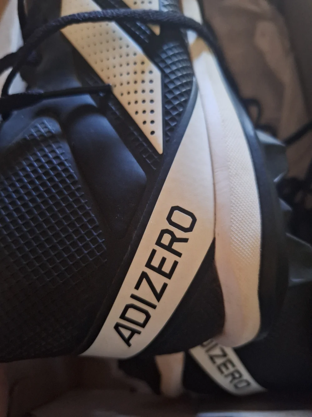 adidas Men's Black & White Athletic Cleats